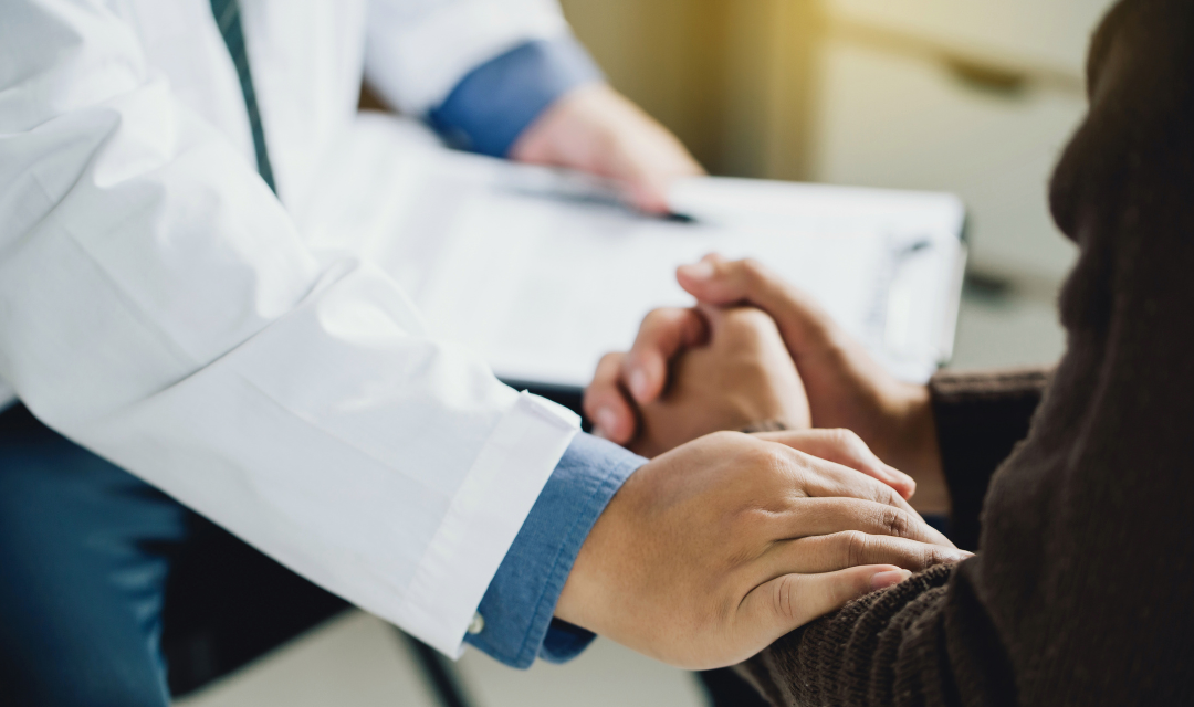 Provider comforting a patient